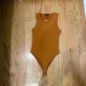 Forever 21 Women's Sleeveless Bodysuit in Burnt Orange